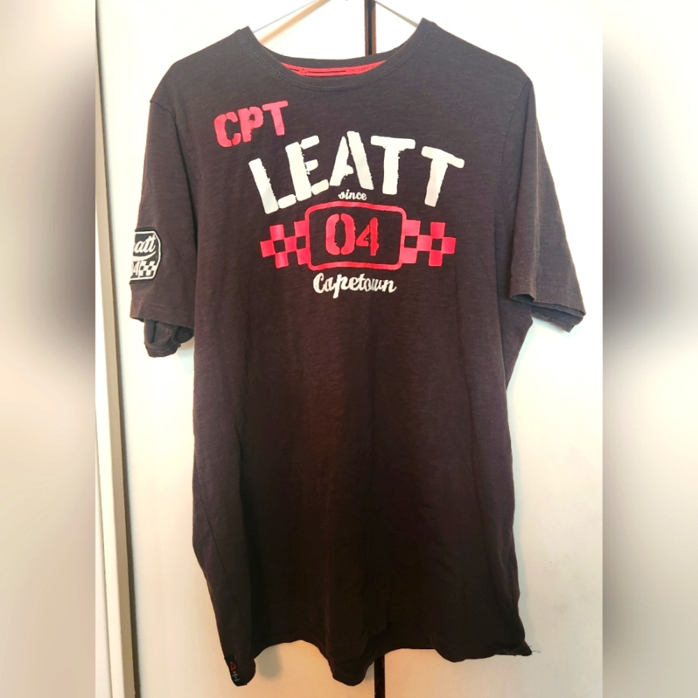 Brown Short Sleeve Leatt Tee with Racing Flag Design. NWOT